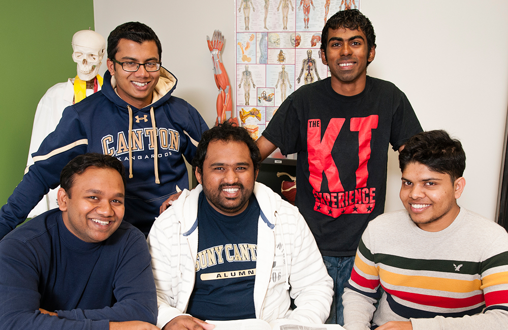 Sri Lanka students pose in a lab