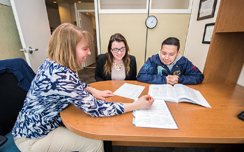 Sharon Tavernier advises two students.