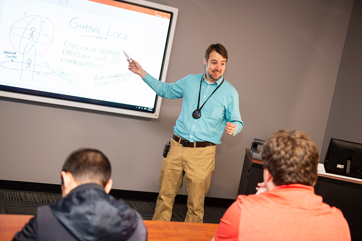 A professor teaches his class using flex modality.